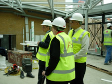 Mike Lloyd and Narendra Makanji show the Mayor the atrium of the new foyer Mike Lloyd and Narendra Makanji show the Mayor the atrium of the new foyer